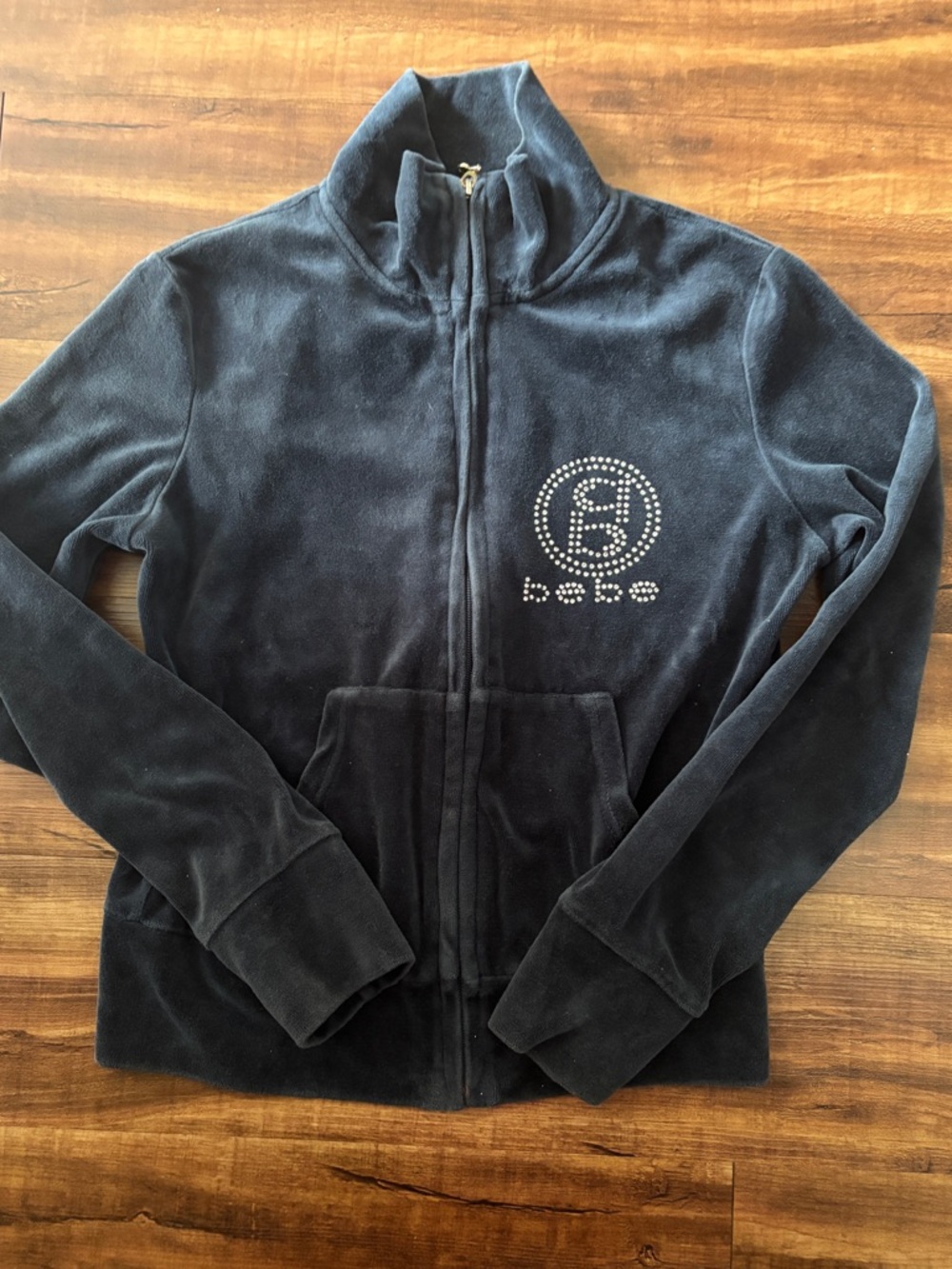 bebe Navy Velour Zip Jacket with Rhinestone Emblem

Medium but fits like small.
